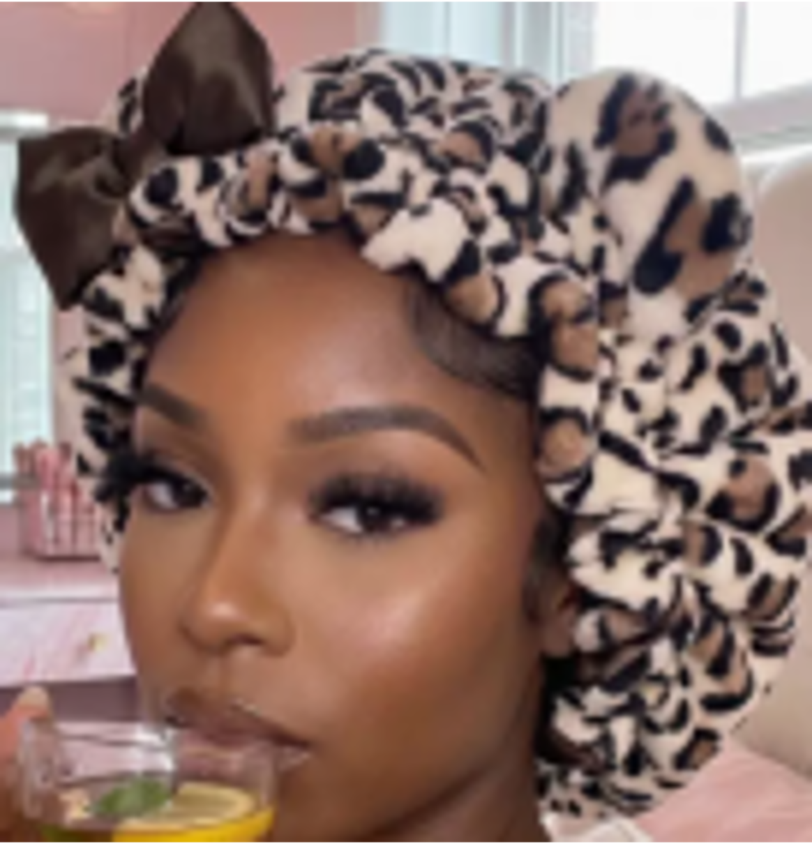 Leopard Print Plush Winter Bonnet with Satin Lining, Ears & Bow